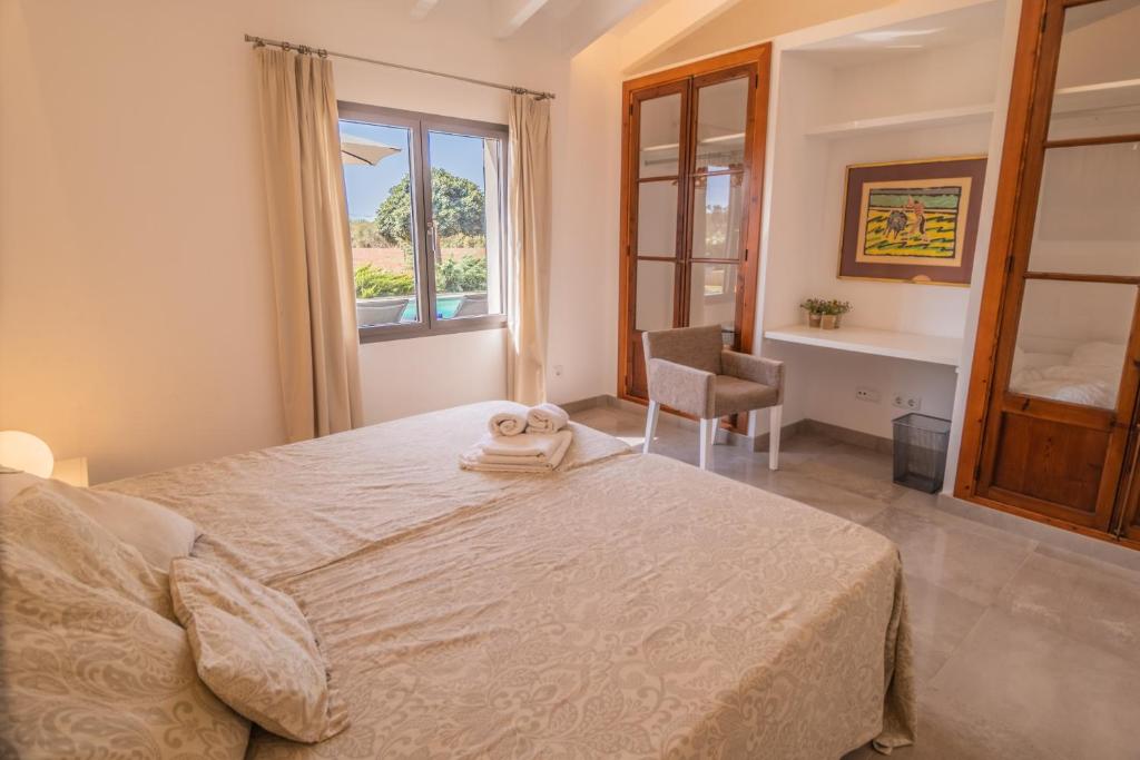 Postel nebo postele na pokoji v ubytování Finca CAN LLORENC by Mallorca Villa Selection