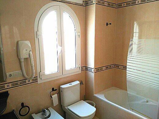 A bathroom at Apartamentos Mérida Center