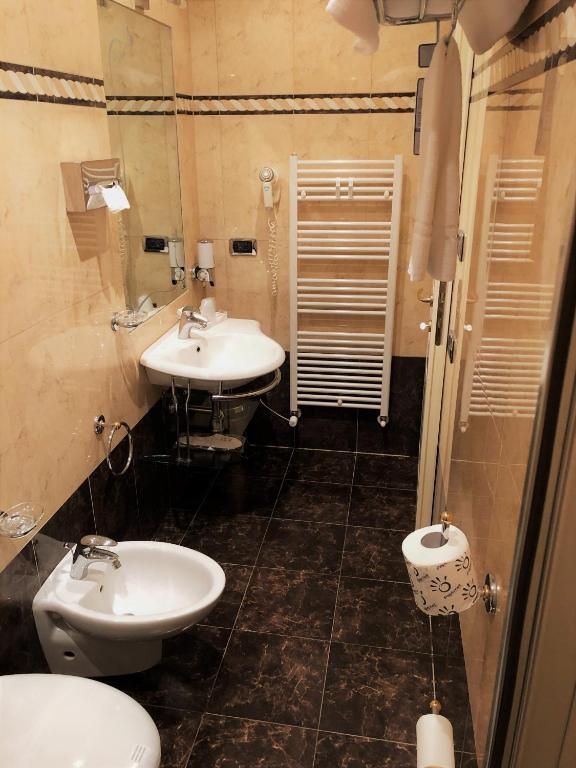 Koupelna v ubytování Hotel La Noce