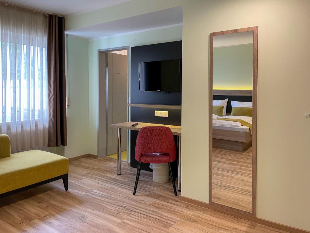 Postel nebo postele na pokoji v ubytování Hotel zur Flüh