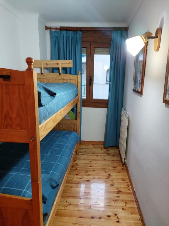 Postel nebo postele na pokoji v ubytování APARTMENT NATURA