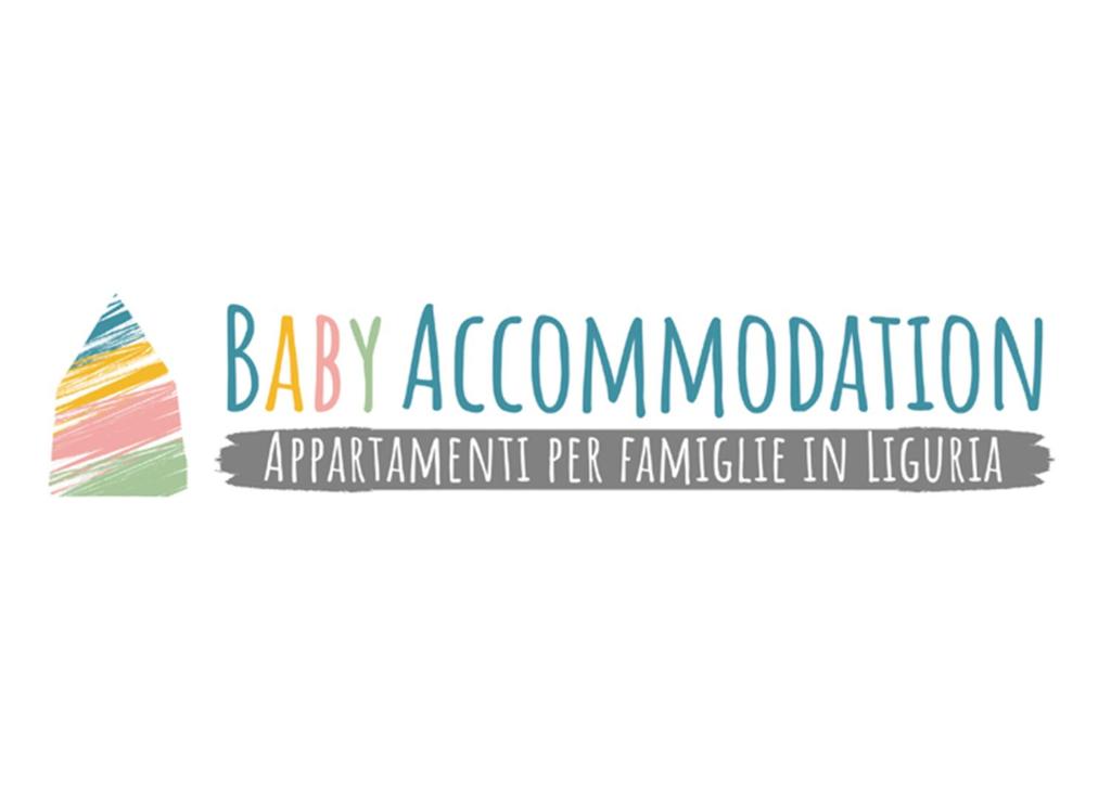 una señal para un anuncio de bebé con un arco iris en Babyaccommodation Family Space, en Ceriale