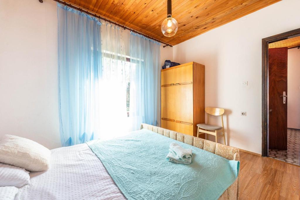 Postel nebo postele na pokoji v ubytování Apartments Danijela
