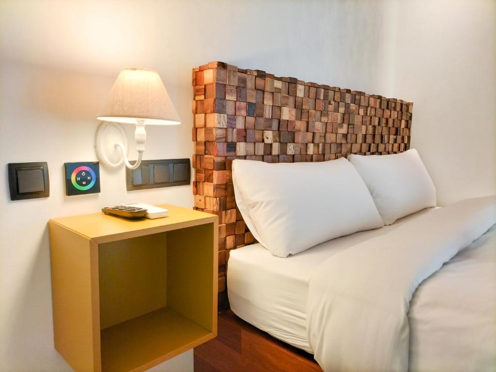 Cama o camas de una habitación en Far Home Bernabeu