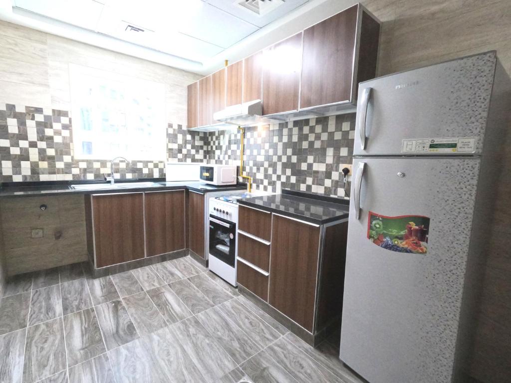 Cucina o angolo cottura di Barsha Star Residence - Home Stay