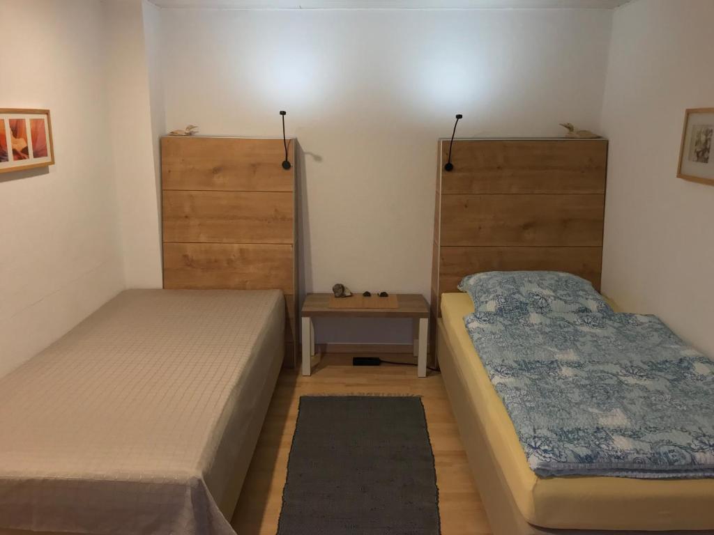 Postel nebo postele na pokoji v ubytování Pension Köthen
