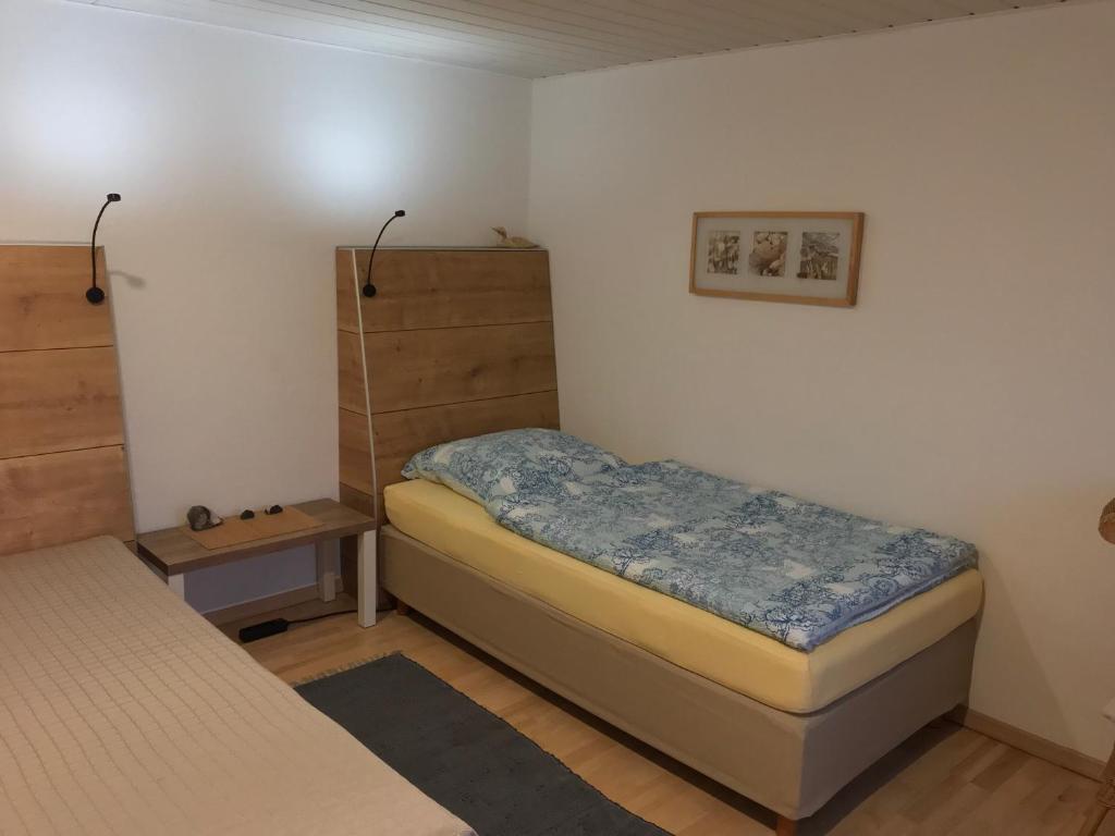 Postel nebo postele na pokoji v ubytování Pension Köthen