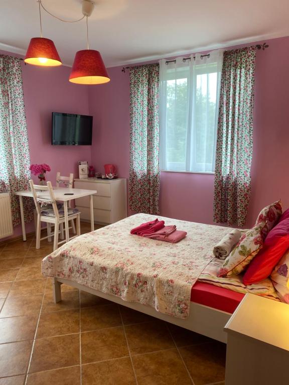 Postel nebo postele na pokoji v ubytování Villa Kokosowa