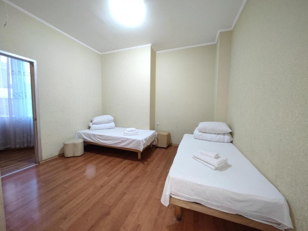 Postel nebo postele na pokoji v ubytování HOTEL ЗiРКА