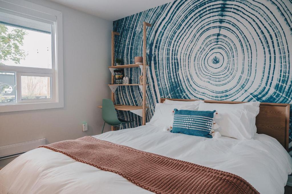 Postel nebo postele na pokoji v ubytování Penny's Motel