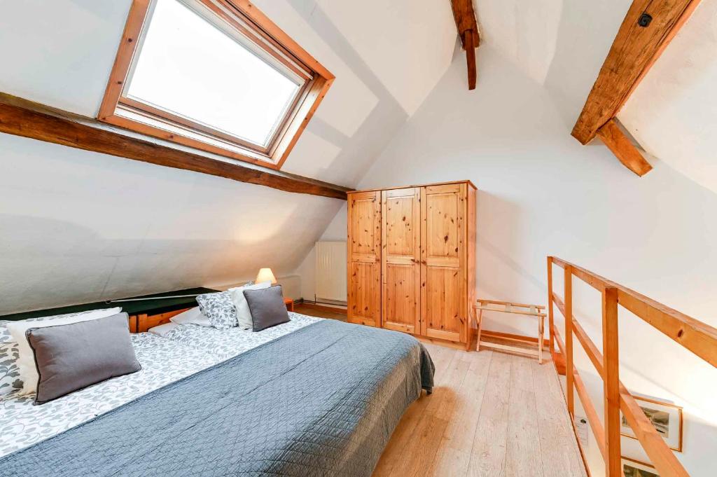 Postel nebo postele na pokoji v ubytování Au Gré des Vents - Gîtes et Chambres d'hôtes