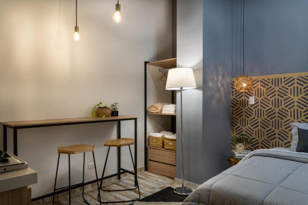 Postel nebo postele na pokoji v ubytování Lexum by Bernalo Hotels
