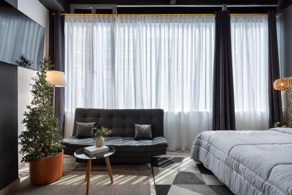 Postel nebo postele na pokoji v ubytování Lexum by Bernalo Hotels