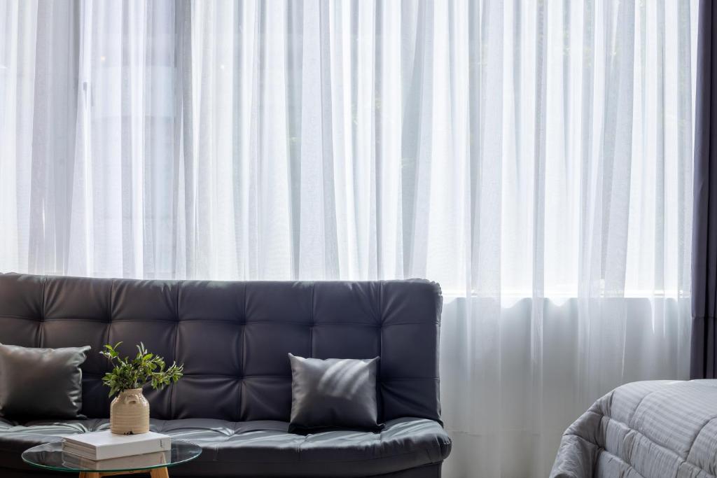 Posezení v ubytování Lexum by Bernalo Hotels