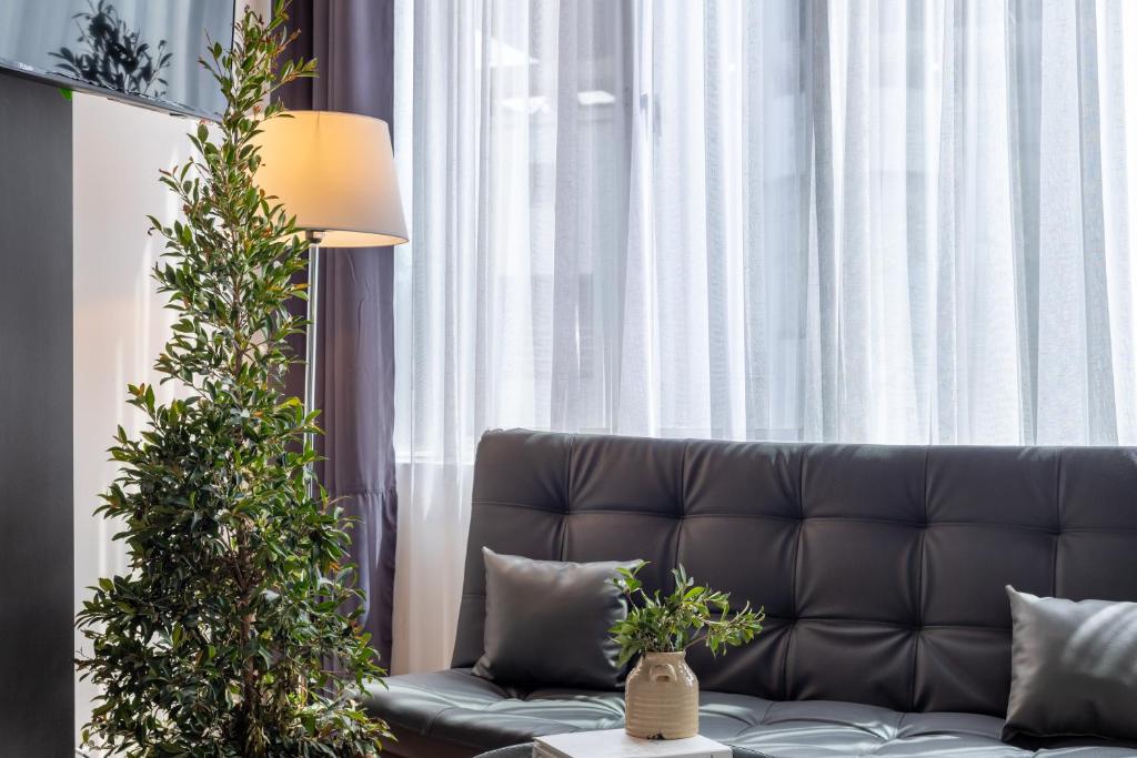 Posezení v ubytování Lexum by Bernalo Hotels