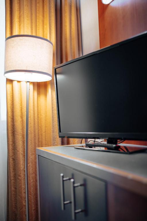 Kuchyň nebo kuchyňský kout v ubytování Hotel Amico
