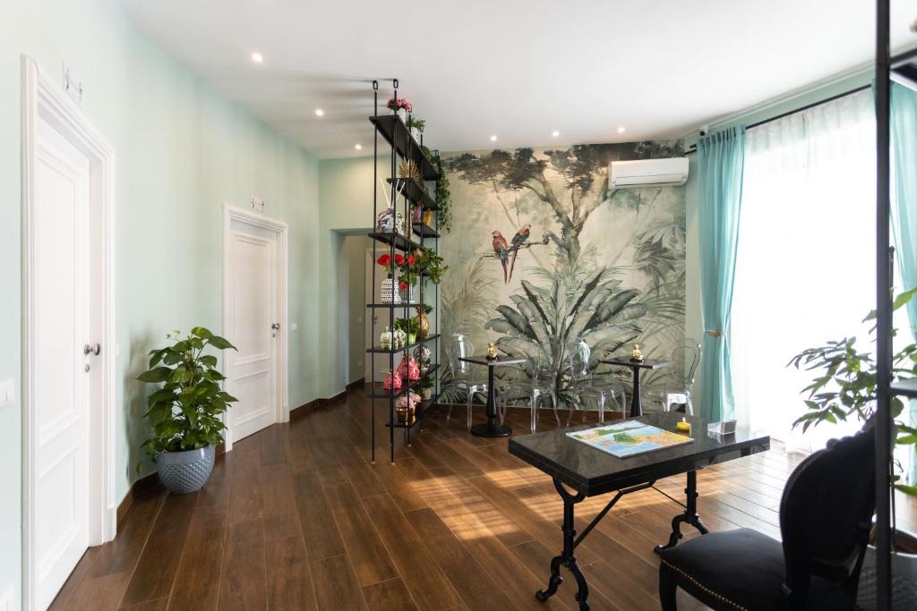 a living room with a painting on the wall at Il Sestante vista mare in Gaeta