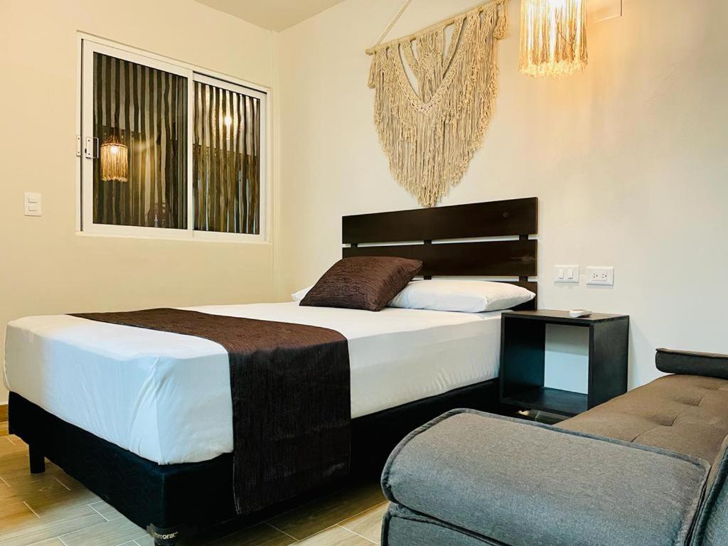 Postel nebo postele na pokoji v ubytování Corazon de Tulum