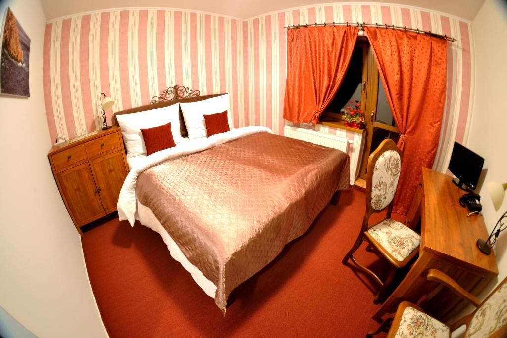 Letto o letti in una camera di B&B Sant Bernard