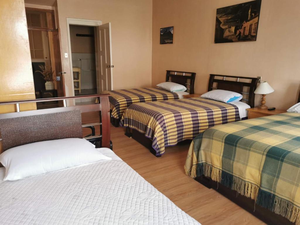 Cama o camas de una habitación en Hotel Rosim
