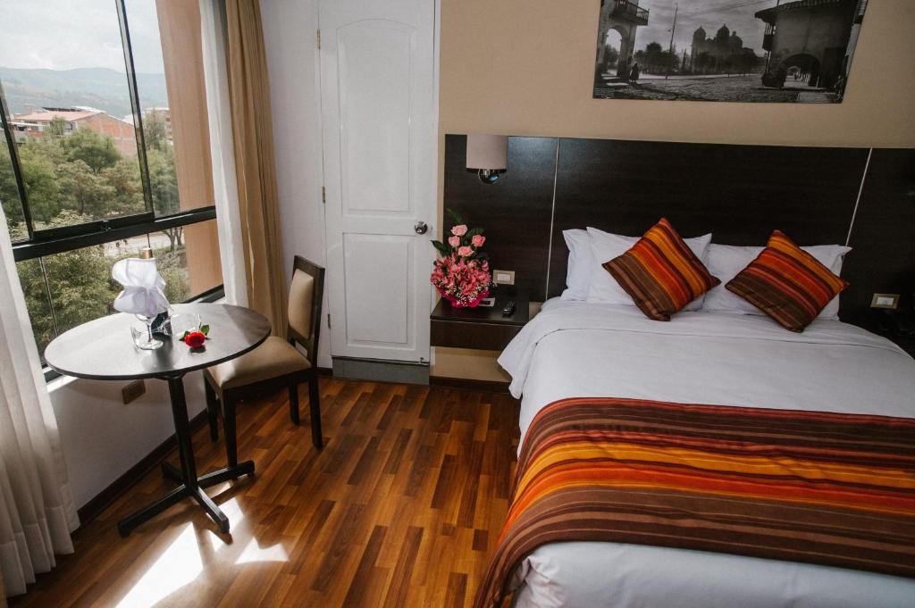 Postel nebo postele na pokoji v ubytování Royal Inn Cusco Hotel