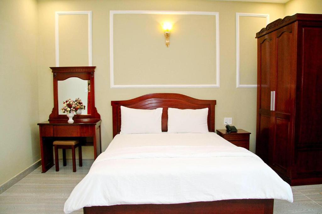 Postel nebo postele na pokoji v ubytování Sea Memory Hotel