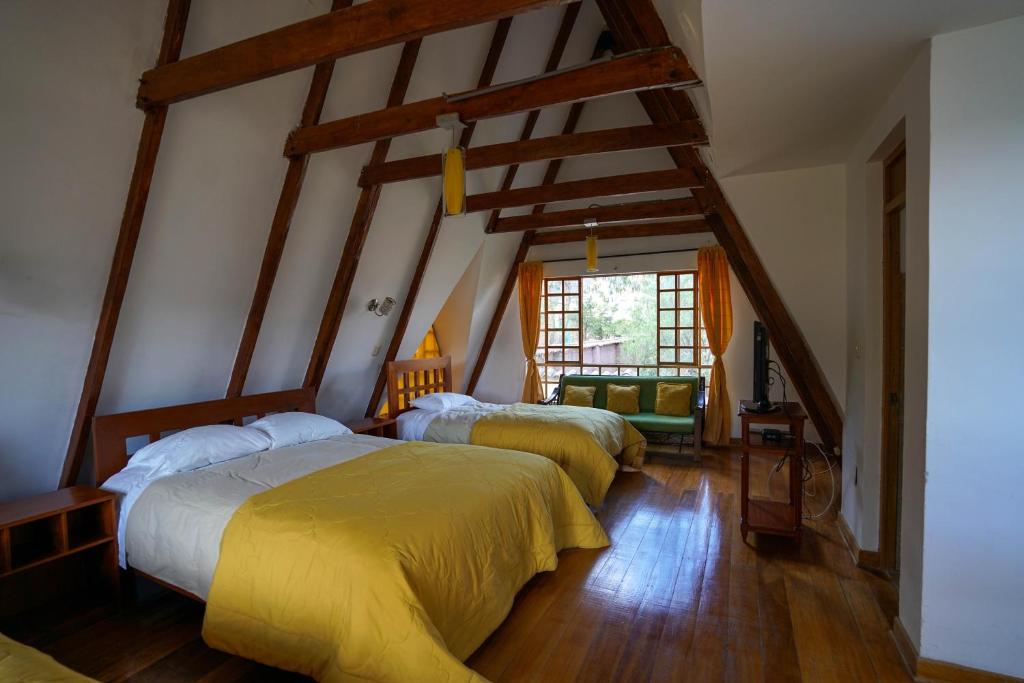 Postel nebo postele na pokoji v ubytování Amaru Valle Hotel