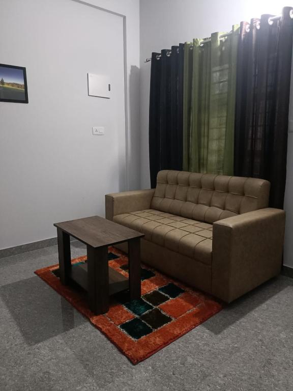 Posezení v ubytování Wayanad Vista Service Apartment