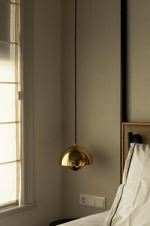 Postel nebo postele na pokoji v ubytování Aparthotel Hattem
