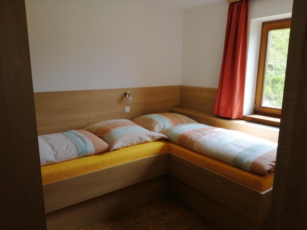 Posteľ alebo postele v izbe v ubytovaní Ferienhaus Sonnenseite