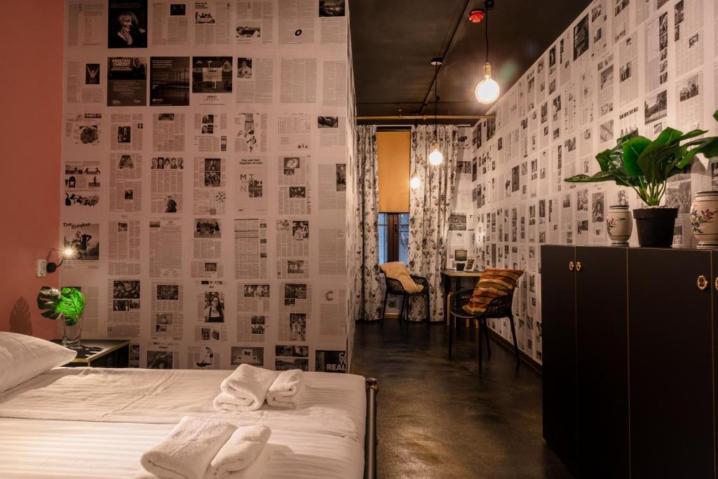 Postel nebo postele na pokoji v ubytování Timeout Heritage Hotel Zagreb