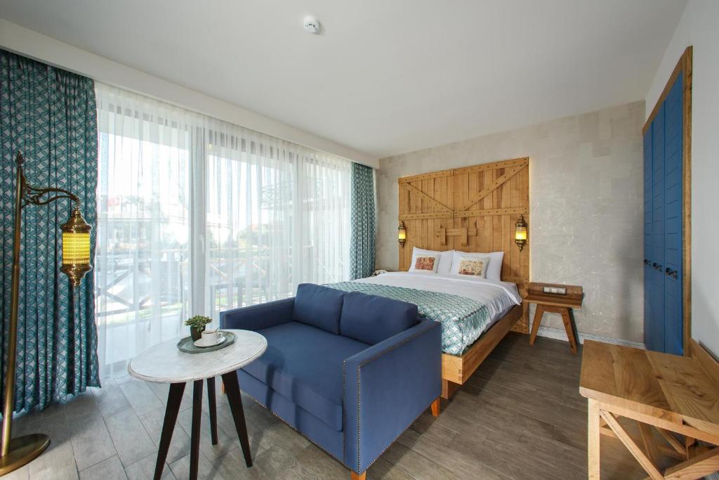 Postel nebo postele na pokoji v ubytování Assos Barbarossa Special Class Hotel