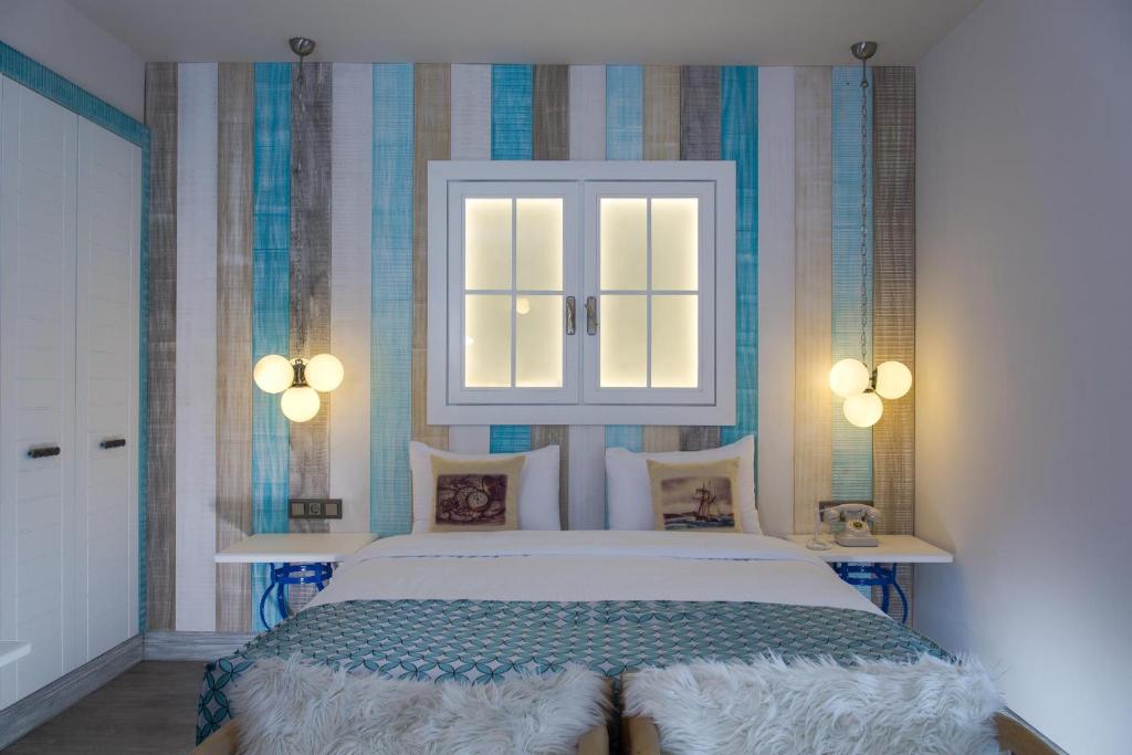 Postel nebo postele na pokoji v ubytování Assos Barbarossa Special Class Hotel
