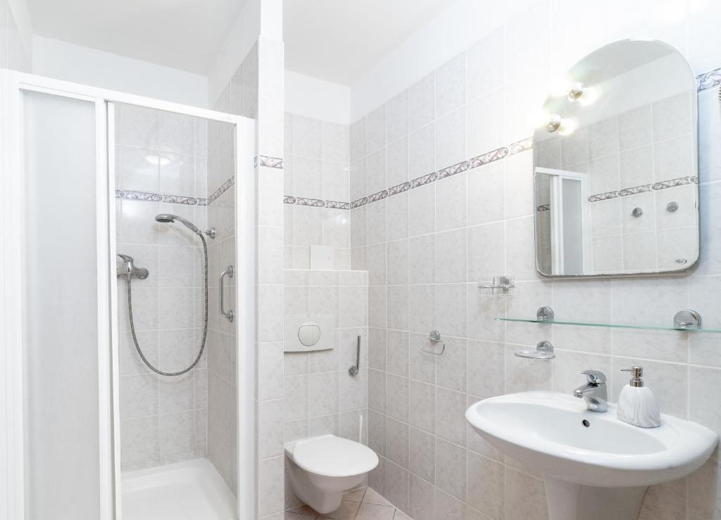 Koupelna v ubytování Hotel Paris