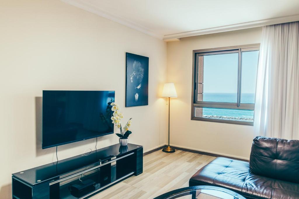 Almog Beach Apartments מגדלי חוף הכרמל חיפה - Suite Con Vista Al Mar
