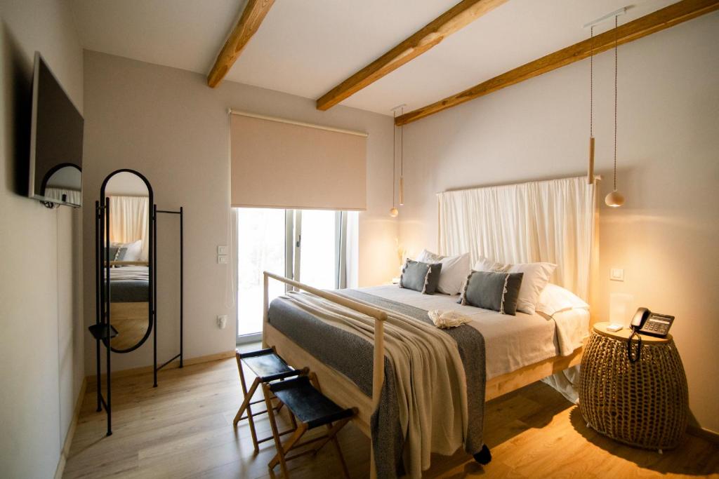 Postel nebo postele na pokoji v ubytování Elies Residences Luxury Apartments