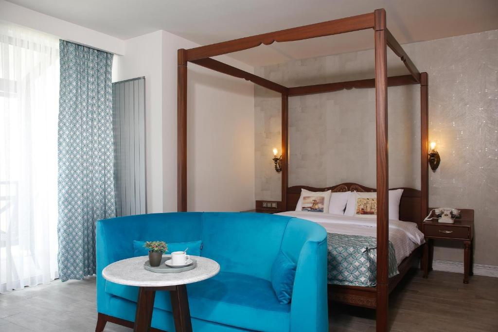 Postel nebo postele na pokoji v ubytování Assos Barbarossa Special Class Hotel