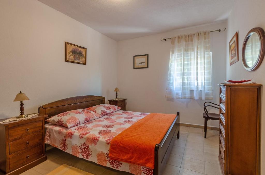 Łóżko lub łóżka w pokoju w obiekcie Vacation House Marija, Korčula
