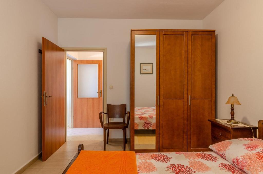 Łóżko lub łóżka w pokoju w obiekcie Vacation House Marija, Korčula