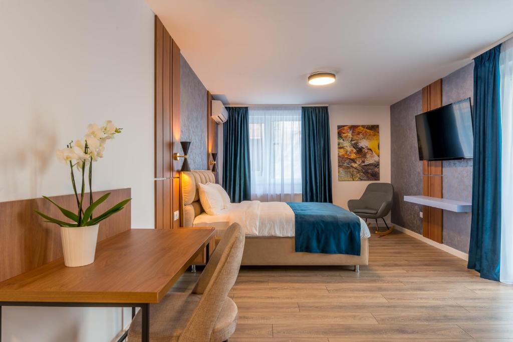 Postel nebo postele na pokoji v ubytování SarmiHouse