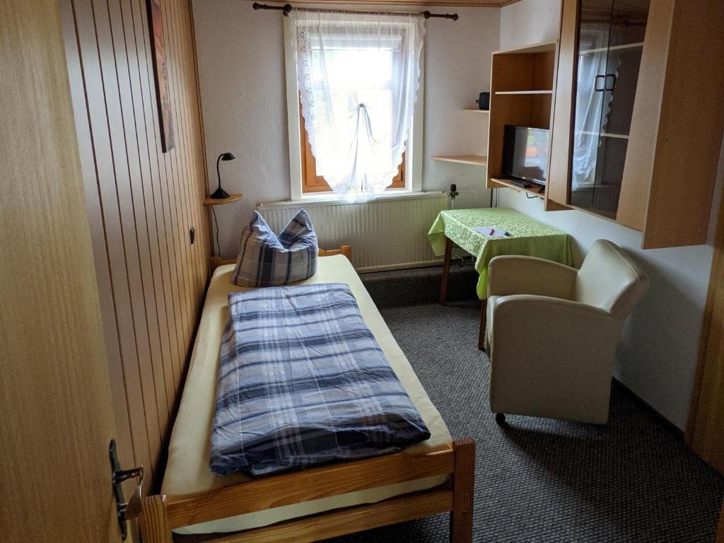 Postel nebo postele na pokoji v ubytování Pension Stepponat