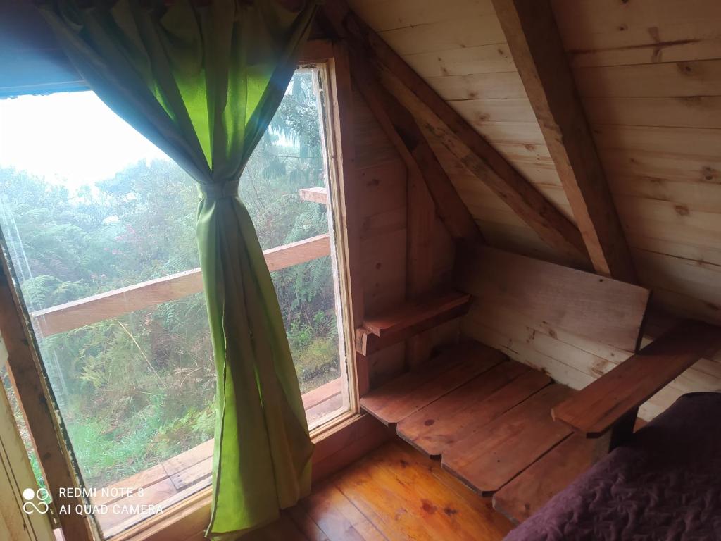 Postel nebo postele na pokoji v ubytování Cabañas el Paraiso Sesquile