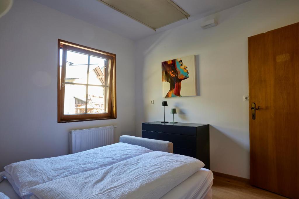Posteľ alebo postele v izbe v ubytovaní Frein Chalets - Wildalm