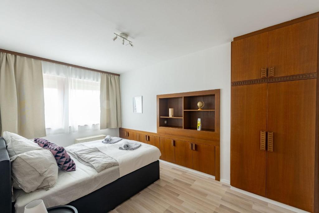 Posteľ alebo postele v izbe v ubytovaní Wohhhlfühl Appartement im Zentrum Graz