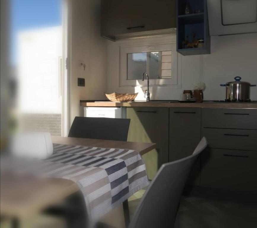 A kitchen or kitchenette at Camping Adriatico