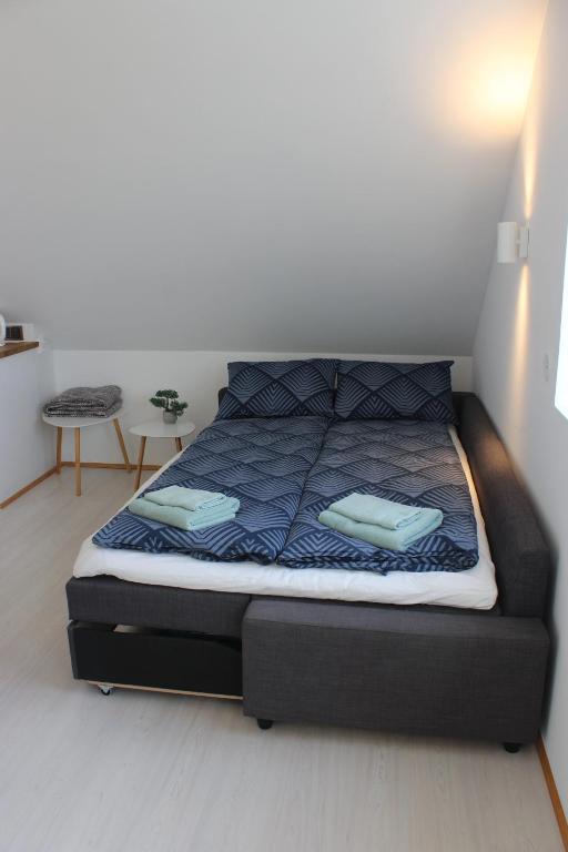Postel nebo postele na pokoji v ubytování Guesthouse Hateigi 3