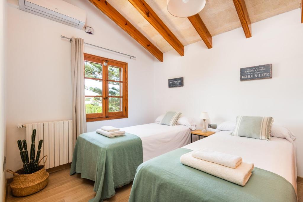 Postel nebo postele na pokoji v ubytování Villa Elena by Mauter Villas