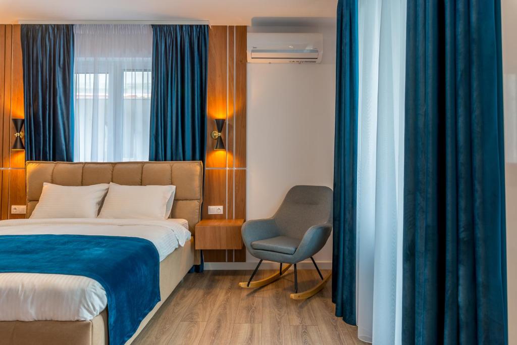Postel nebo postele na pokoji v ubytování SarmiHouse