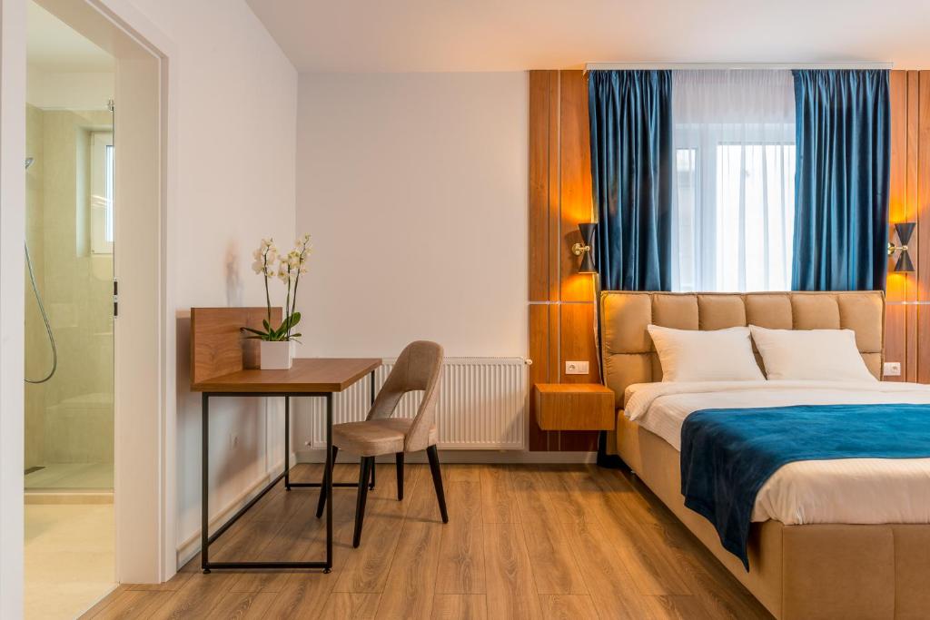Postel nebo postele na pokoji v ubytování SarmiHouse