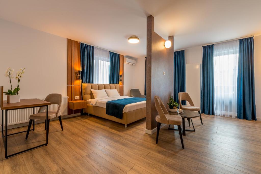 Postel nebo postele na pokoji v ubytování SarmiHouse